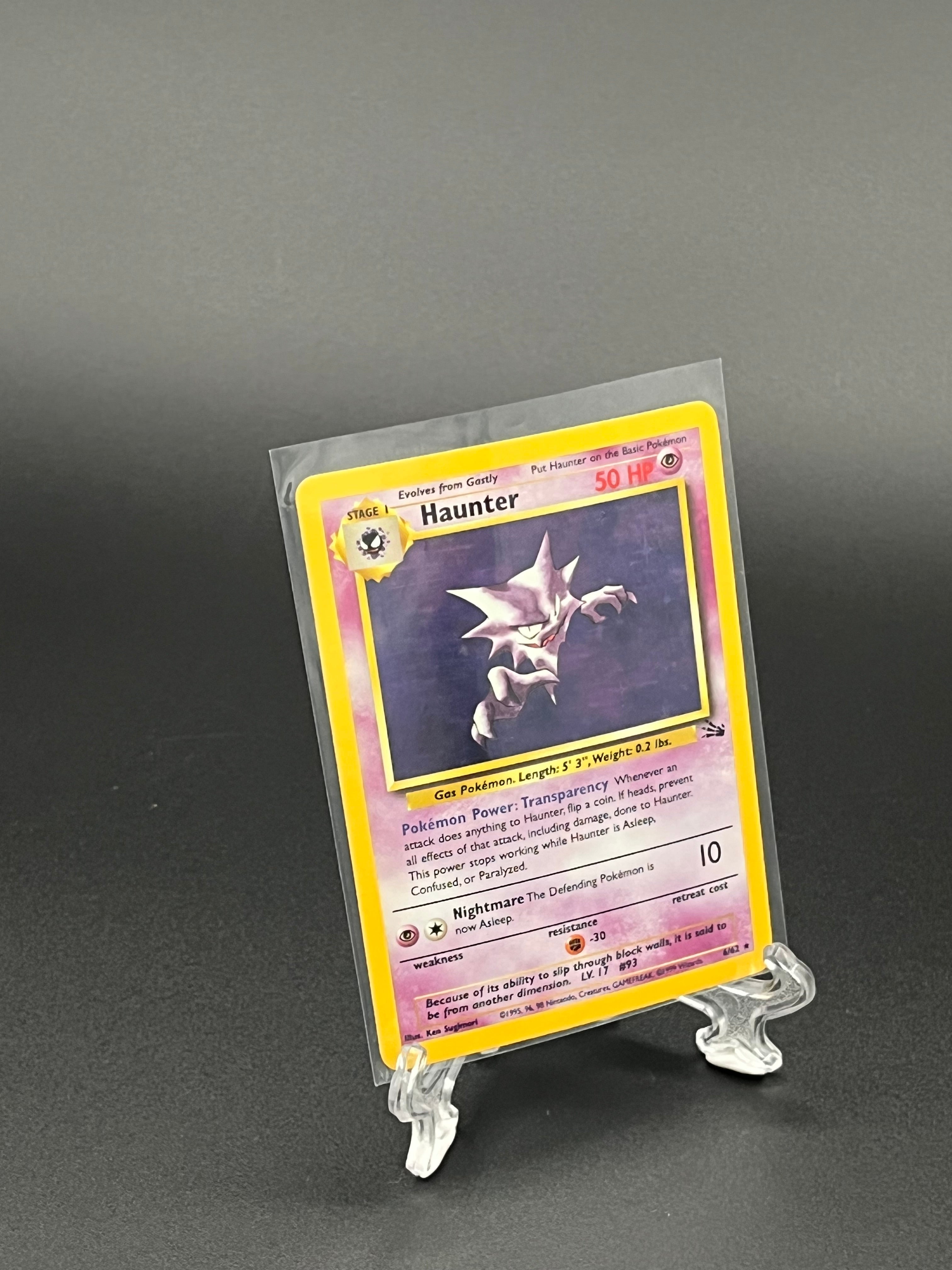 Pokémon trading card in protective packaging on a dark background