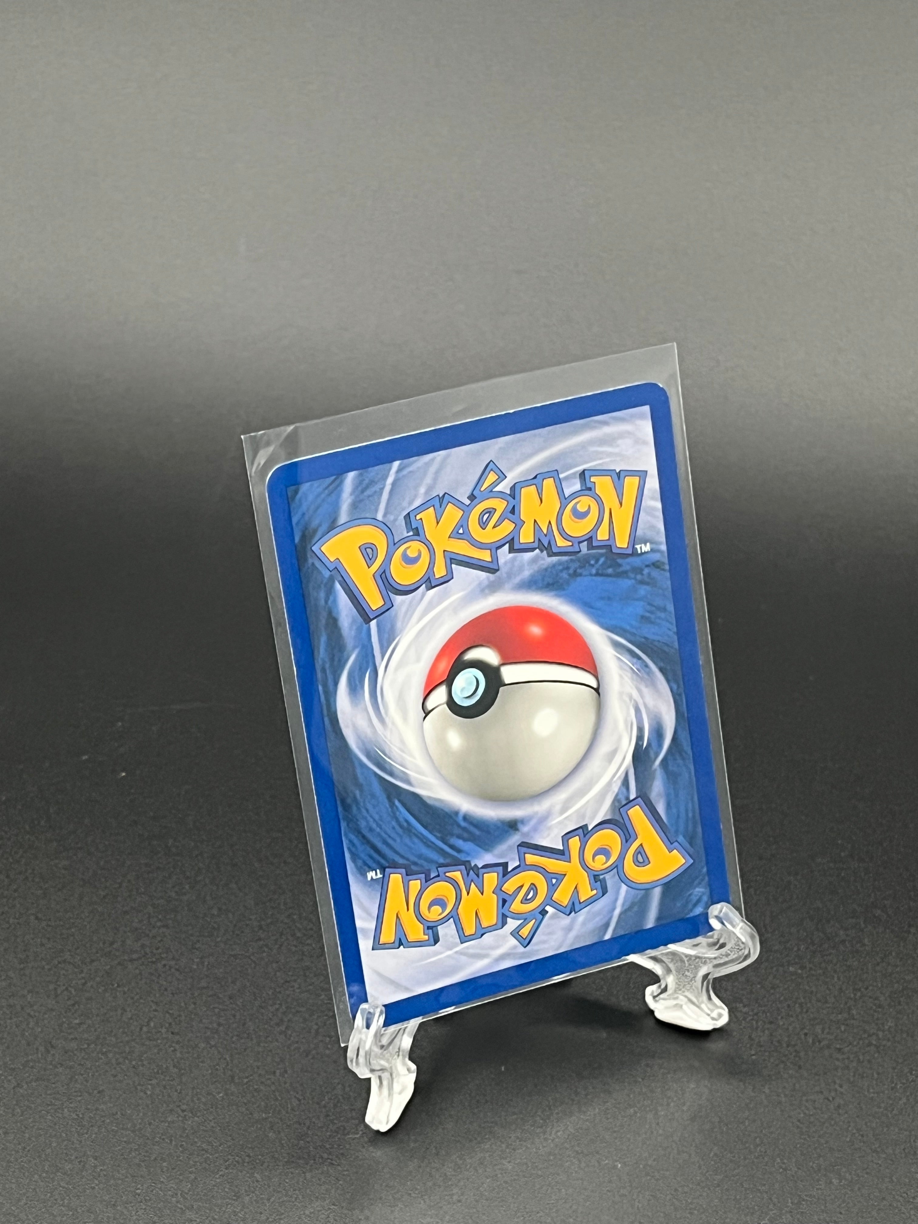 Pokémon trading card in a clear protective sleeve on a dark background