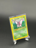 Pokémon trading card in a clear protective holder on a dark background