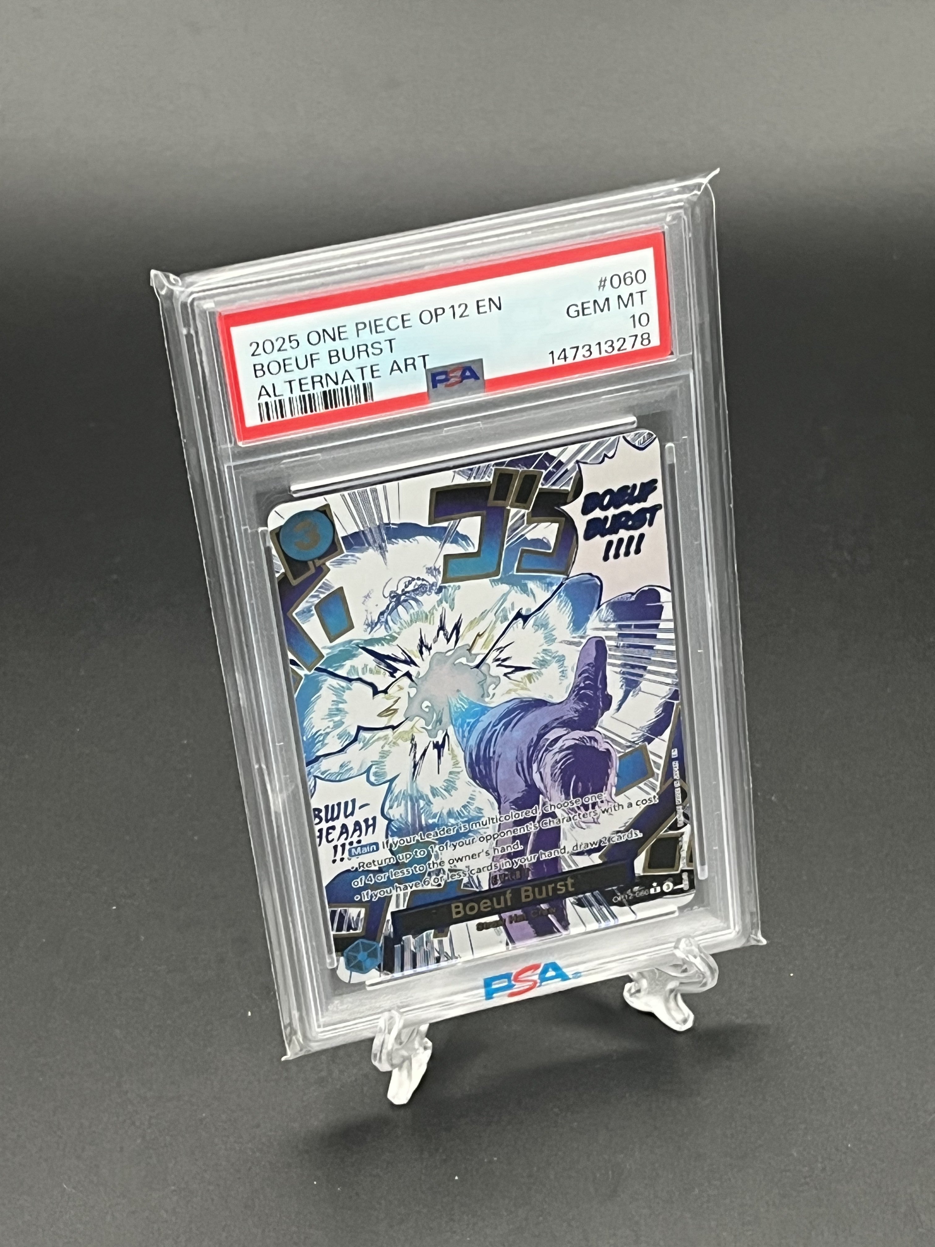 Trading card in a protective case with PSA and Graded logo on a gray background